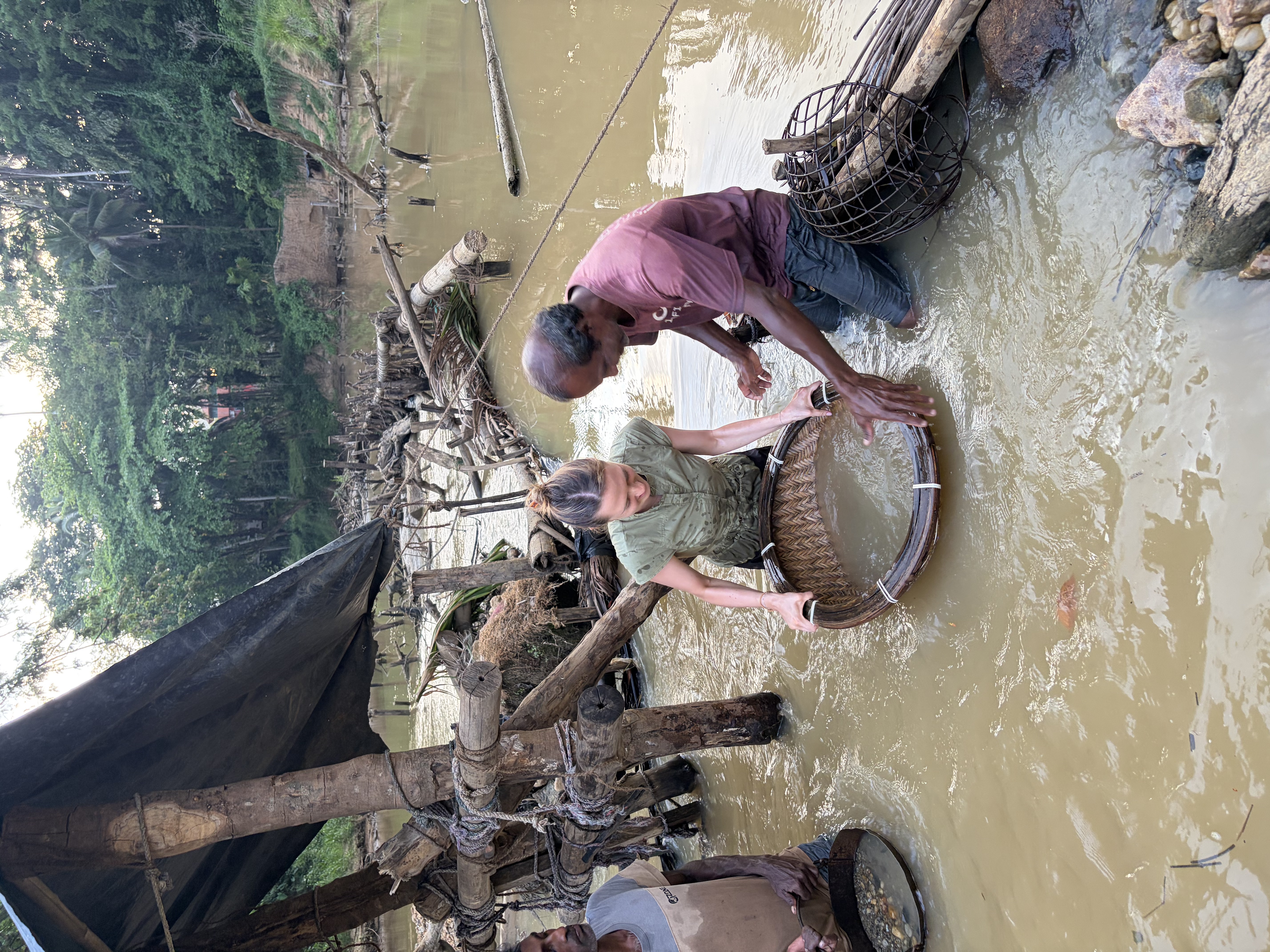Larissa Bentham panning for sapphires in the river
